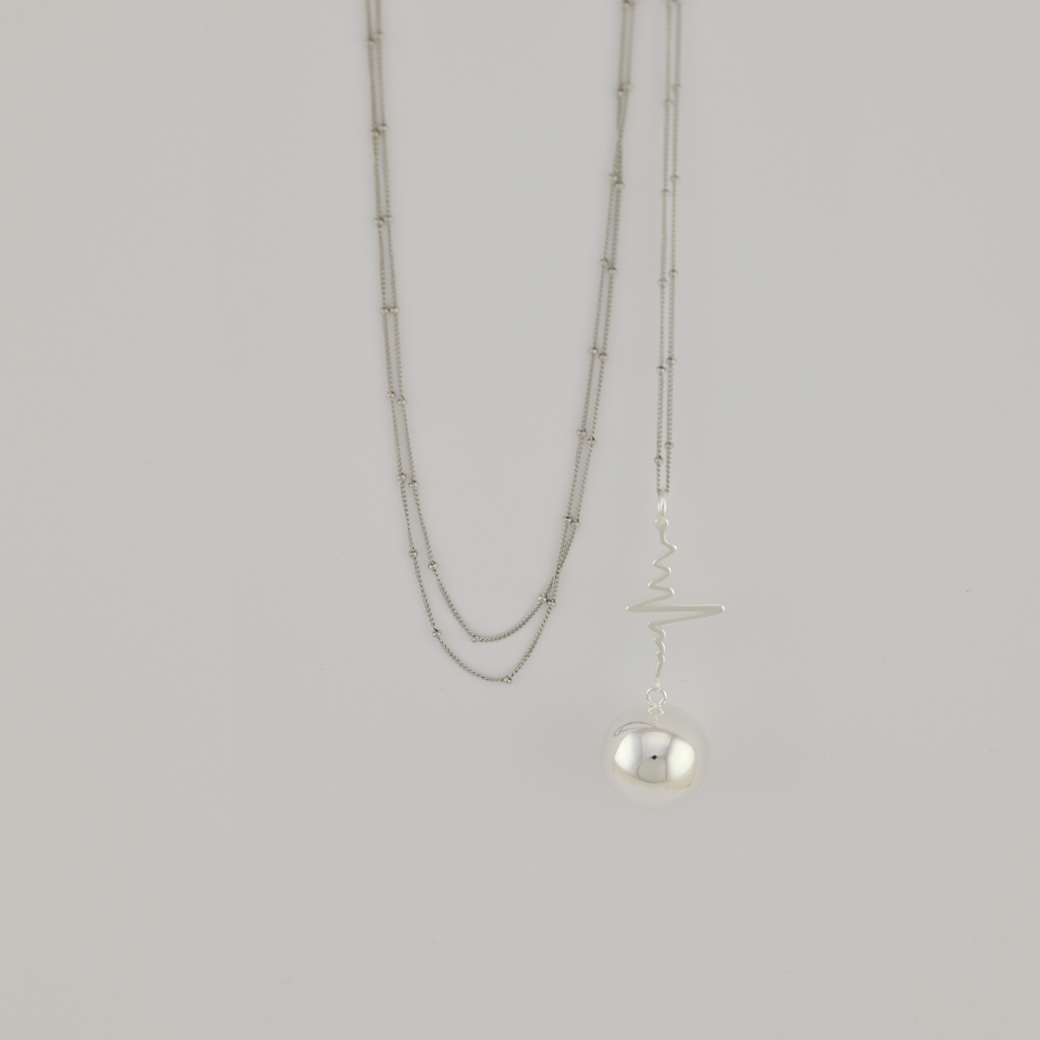 Bola de grossesse Spirales Argent – Bijou pour future maman avec chaîne – Image 2